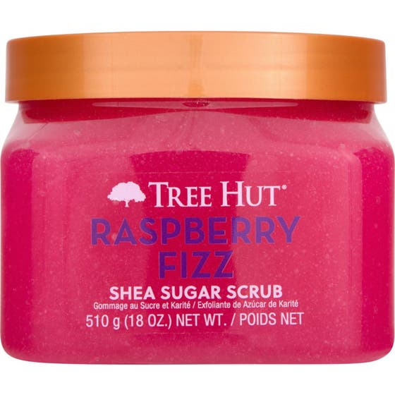 Tree Hut Raspberry Fizz Shea Sugar Scrub 510 g exfolierande sockerskrubb i genomskinlig burk med rosa textur och orange lock