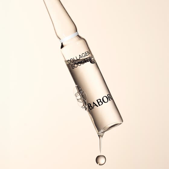 Babor Ampoule Collagen Booster 14 ml ampull ger kollagen för huden i en genomskinlig glasampull med en droppe.