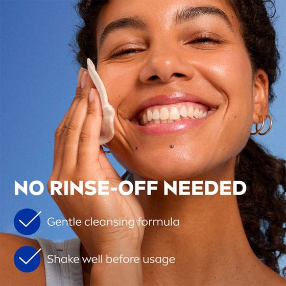 NIVEA Double Effect Eye Make-up Remover 125 ml ögonrengöring för vattenfast mascara borttagning på leende kvinna.