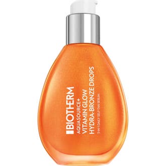 Biotherm Aquasource+ Vitamin Glow Hydra-Bronze Drops 30ml ger solkysst lyster i orange droppformad flaska med silverpump.