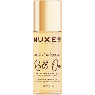 Nuxe Huile Prodigieuse Roll-On 60 ml närande skönhetsolja som ger lyster i en smal glasflaska med lyxig guldkork.