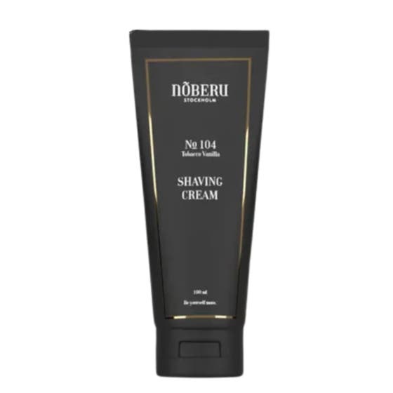 Nõberu No 104 Tobacco Vanilla Shaving Cream 100 ml rakkräm som ger mjukt glid i en matt svart tub med guldram.