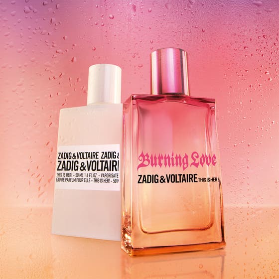 Zadig & Voltaire This Is Her Burning Love 30 ml Eau de Parfum i rosa och orange glasflaska med daggig bakgrund