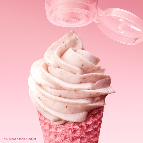 Nuxe Very Rose Gentle Face Scrub 75 ml ansiktsskrubb för lyster med synliga aprikoskärnor i en rosa glasstrut.