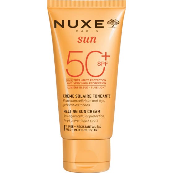 Nuxe Sun Melting Sun Cream SPF 50 50ml anti-age solskydd i en persikofärgad tub som motverkar mörka fläckar.