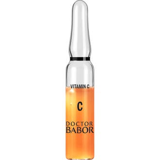 Doctor Babor Vitamin C 2 ml ampull behandling hudglöd i en genomskinlig glasampull med orange serum