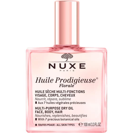 Nuxe Huile Prodigieuse Florale 100 ml vårdande ansiktsolja torr hud och hårolja spray i en rosa glasflaska med lös kork