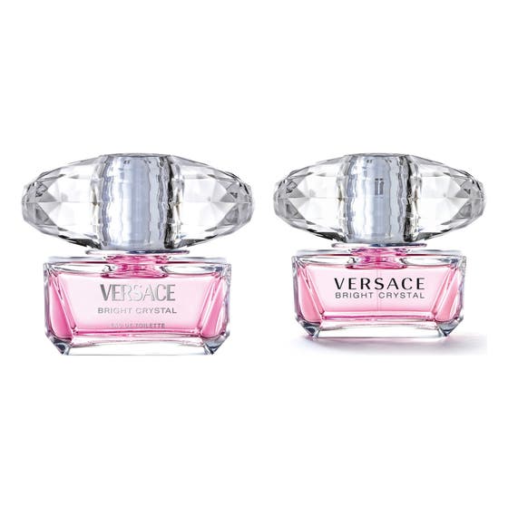 Versace Bright Crystal parfymset med blommig parfym i två rosa glasflaskor med stora facetterade lock