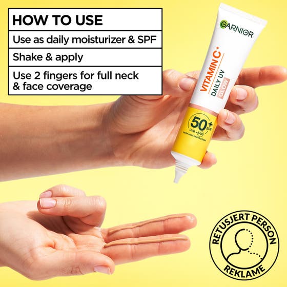 Garnier Skin Active Vitamin C Daily UV Fluid 40 ml ansikts spf50 med citronskivor i laboratorieglas för lyster.