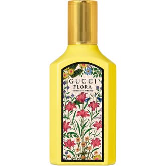 Gucci Flora Gorgeous Orchid 50 ml blommig parfym i gul glasflaska med blommigt mönster och guldkork