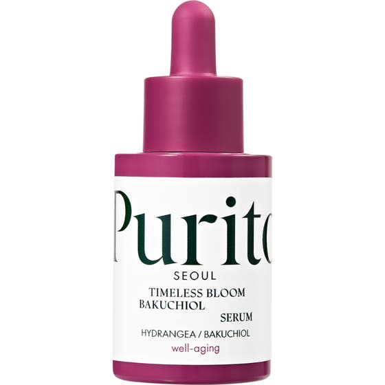 Purito Timeless Bloom Bakuchiol Serum förbättrar hudelasticitet i en lila glasflaska med vit etikett och pipett.