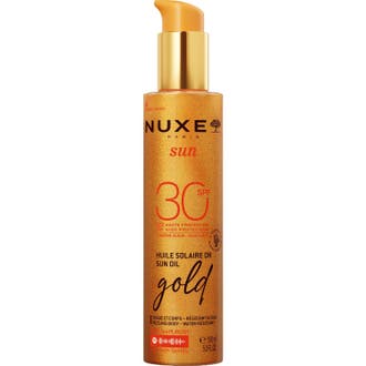 Nuxe Sun Oil Gold 150 ml nuxe solskydd ansikte och kropp är en guld solbränningsolja i skimrande bärnstensfärgad flaska.
