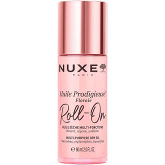 Nuxe Huile Prodigieuse Florale Roll-On 8 ml vårdande torrolja i rosa glasflaska med glänsande rosa lock.
