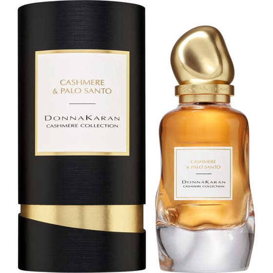 DKNY Cashmere Collection Palo Santo 100 ml damparfym i elegant glasflaska med guldkork och svart tub