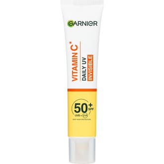 Garnier Vitamin C Daily UV Invisible SPF 50+ lystergivande garnier solskydd ansikte i vit och gul tub med klar kork