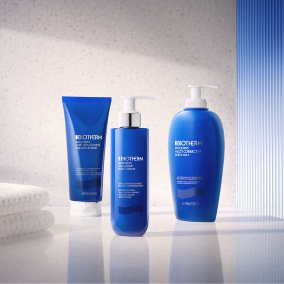 Biotherm Biocorps Multi-Corrective Body Milk 400 ml med krämig vit textur för fast-stärkande kroppsvård.