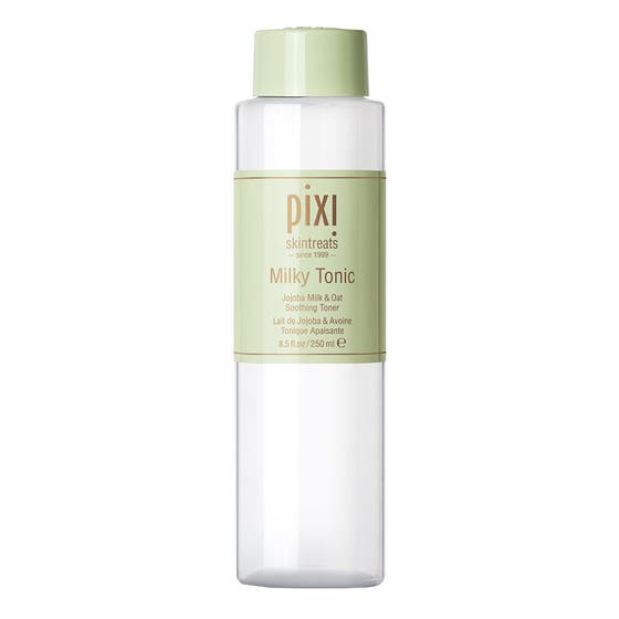Pixi Skintreats Milky Tonic 250 ml fuktgivande toner hudvårdsrutin med havre i klar flaska med grönt lock och etikett.