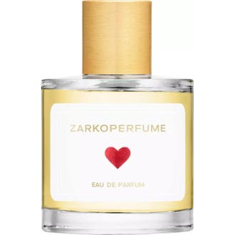 Zarkoperfume Sending Love 100 ml eau de parfum ger en varm parfym i genomskinlig glasflaska med guldkork och rött hjärta