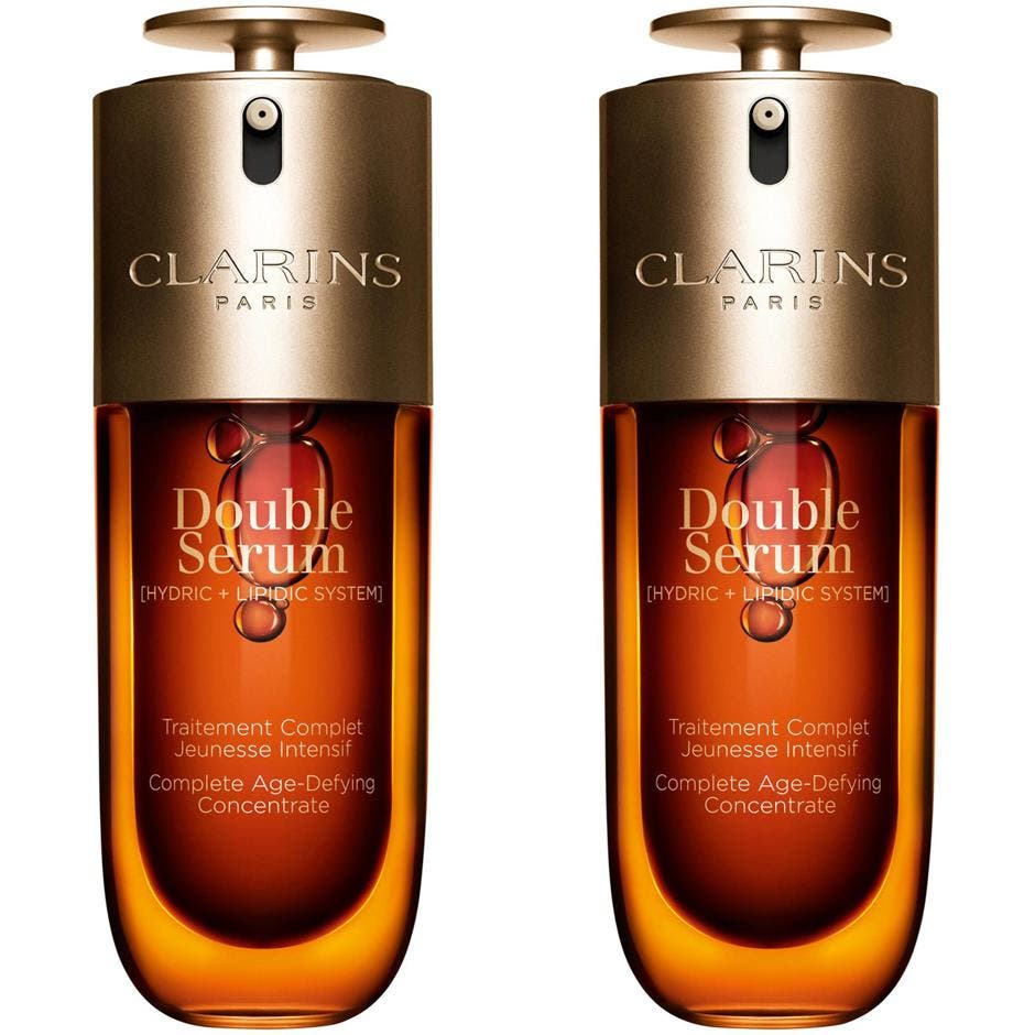 Clarins Double Serum föryngrande dubbelserum som ger ungdom i en elegant bärnstensfärgad flaska med guldpump